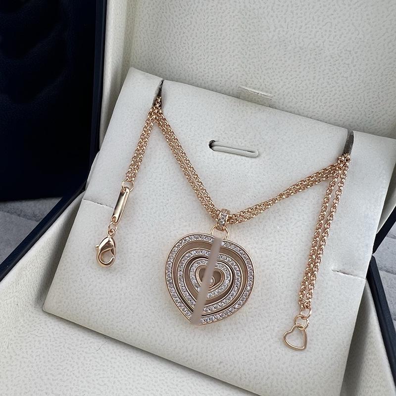 Elegant Rotating Heart Double Chain Necklace with Full Diamond Circles - Women s Luxury Fashion