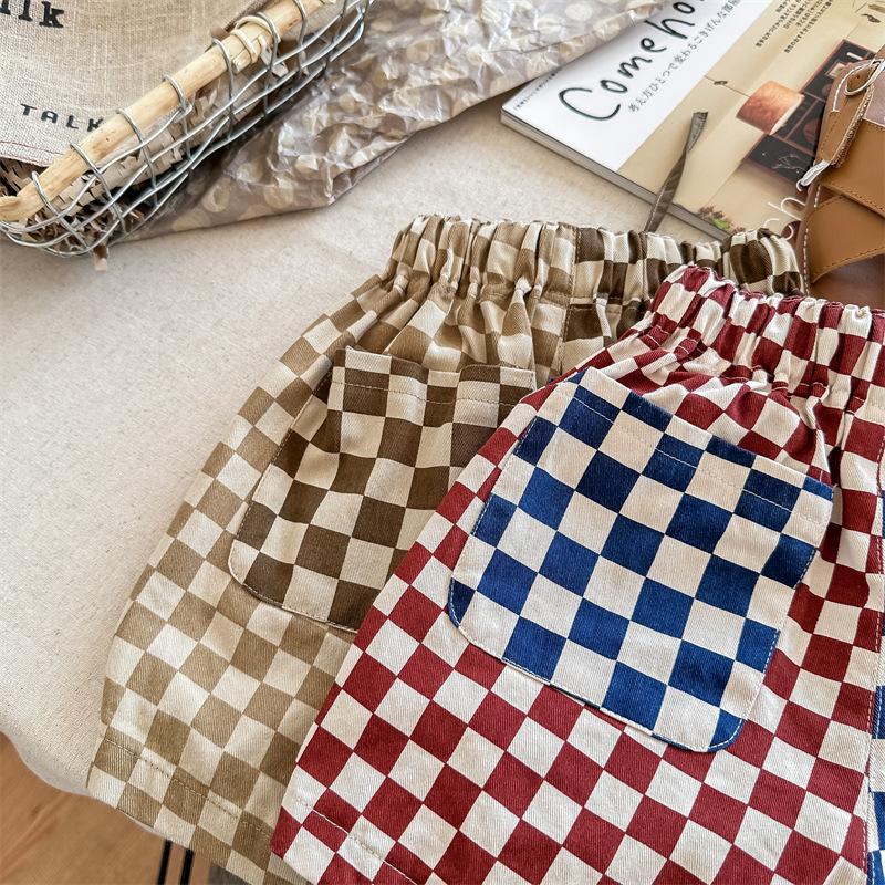 Dziecięce Letnie Cienkie Szorty Patchworkowe Niemowlęce Dziewczęce Luźne Butikowe Krótkie Spodnie dla Chłopców Modne Kraciaste Bawełniane Krótkie Spodnie
