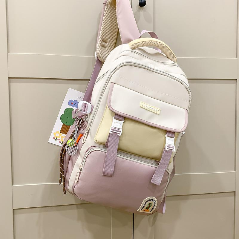 New large-capacity contrasting color schoolbag, waterproof protection for campus students, durable and lightweight backpack, trend research backpack.