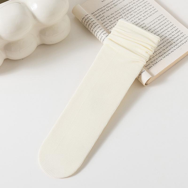 

Женские ультратонкие летние носки до середины икры Lightning Warehouse - однотонные, легкие, дышащие и в индивидуальной упаковке. One Size