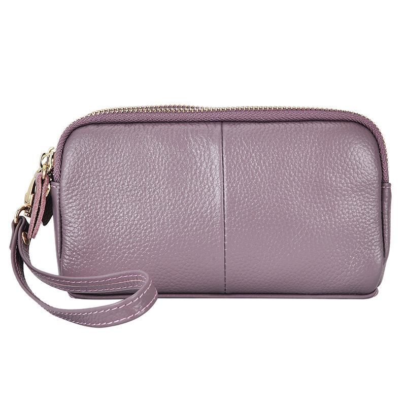 One piece is sent on behalf of the first layer of cowhide clutch bag, new trendy and fashionable women's medium mother bag wallet.