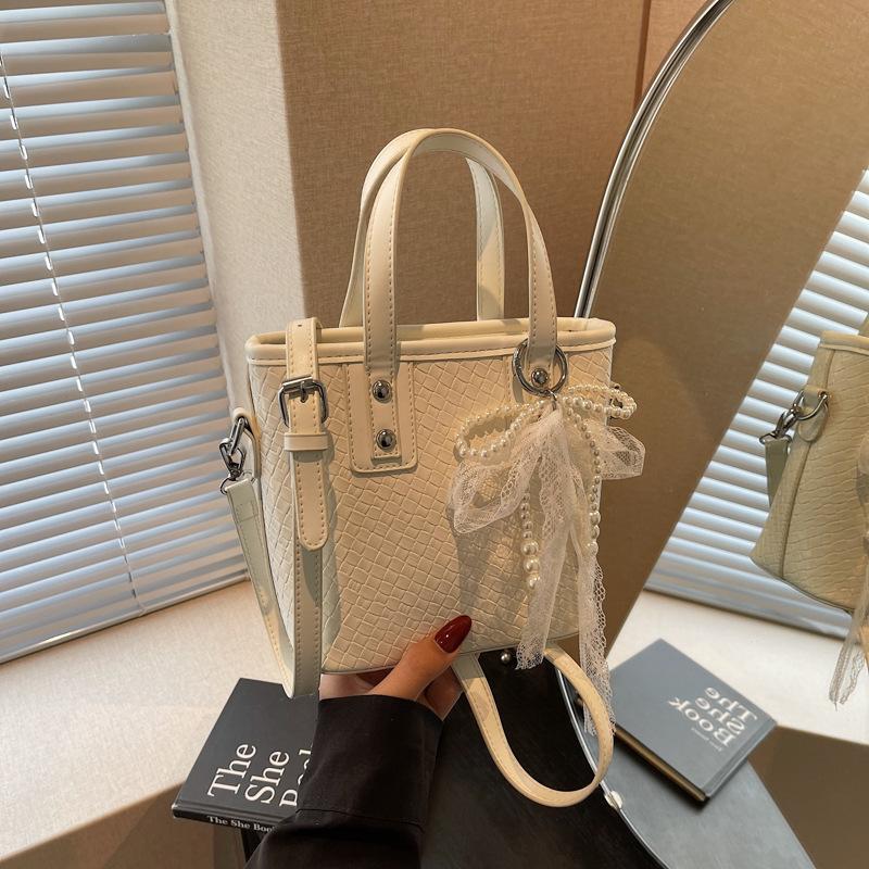 Premium sense simple portable bucket bag women's 2025 summer new fashion contrasting color messenger bag