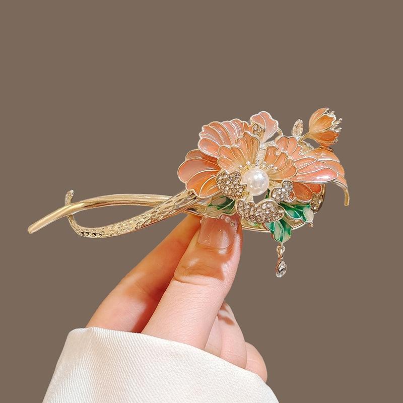 Factory direct fashion flower pearl twist clip elegant hairpin Internet celebrity head spring clip