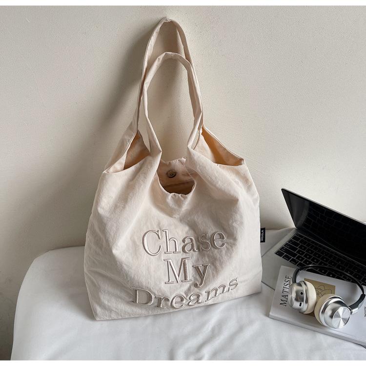 Casual lazy wind large capacity armpit bag women's summer new letter embroidered tote canvas bag