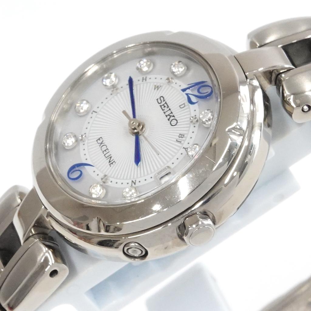 SEIKO Exceline SWCW121 Ladies Solar Titanium Watch with 9 Diamond Accents Radio-Controlled (1B22-0CH0)