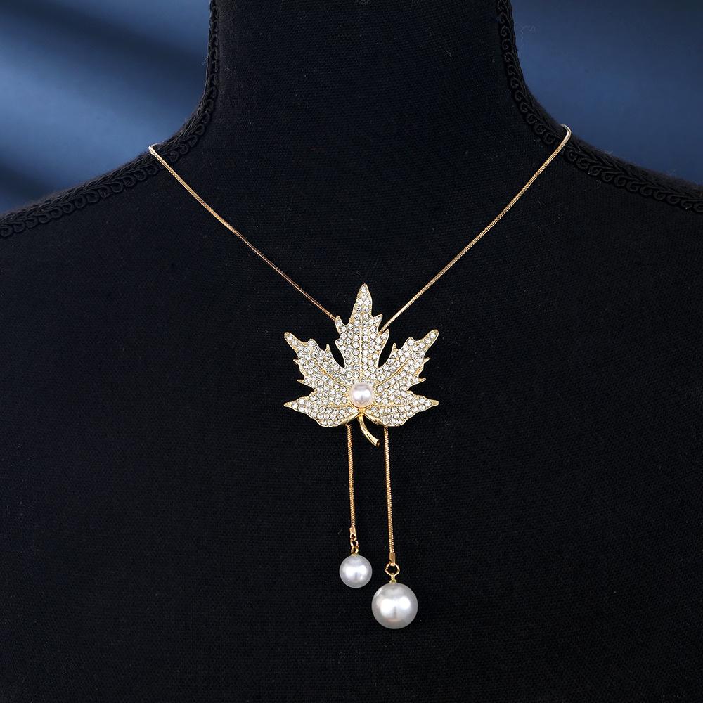 Winter hot-selling maple leaf sweater chain women's simple long necklace pendant jewelry clothes accessories