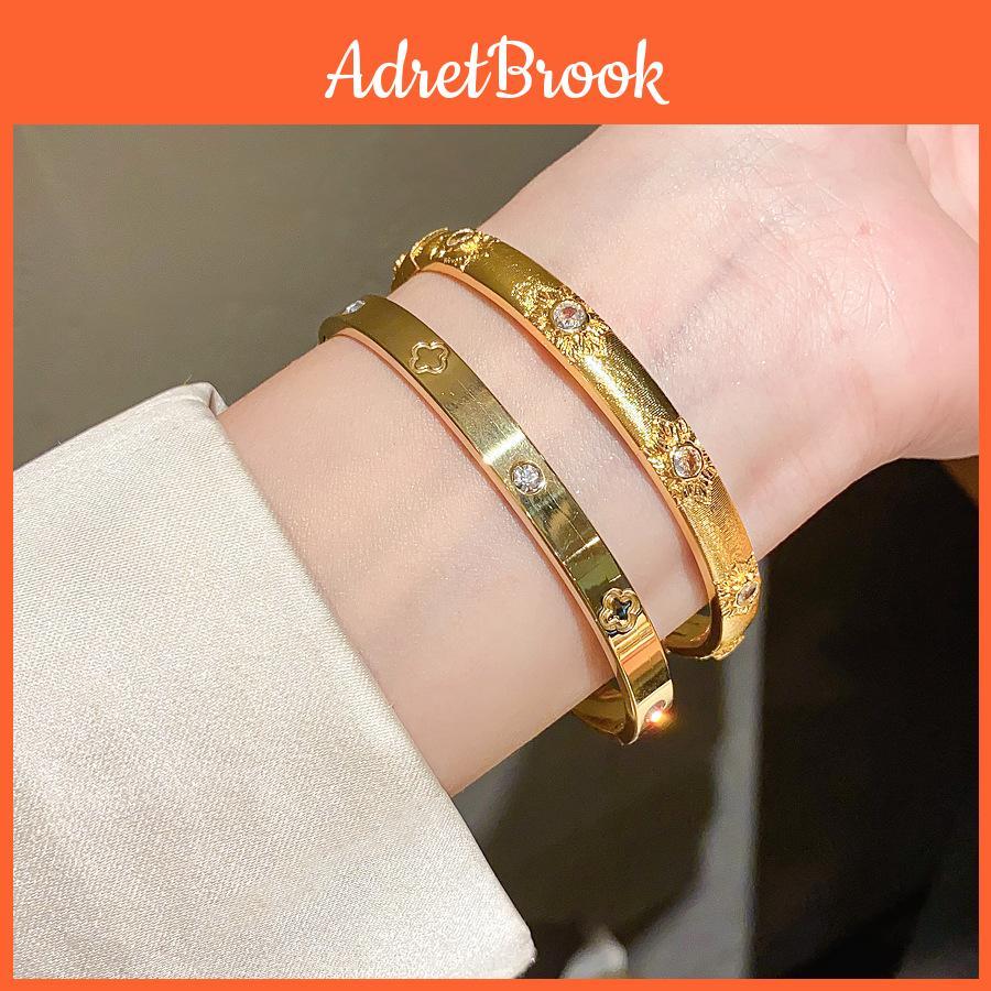 Vintage Floral Copper Bracelet With Zirconia Stones For Elegant Hand Jewelry