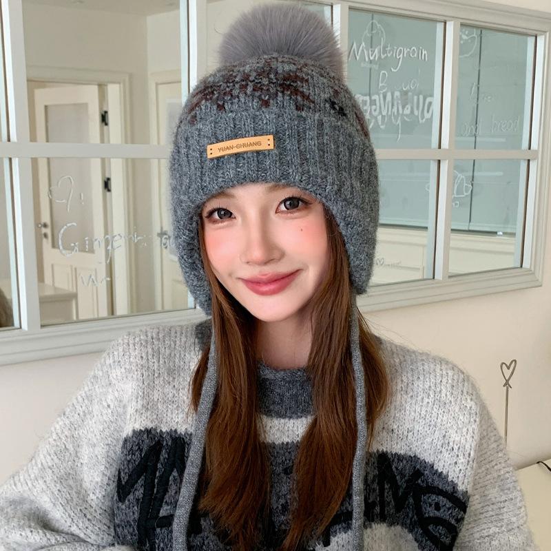Winter hat women's snowflake jacquard warm knitted hat windproof and cold protection ear protection headgear versatile casual wool hat