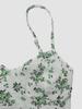 Robe à bretelles spaghetti en dentelle florale à lacets pour femme avec nœud et large ourlet