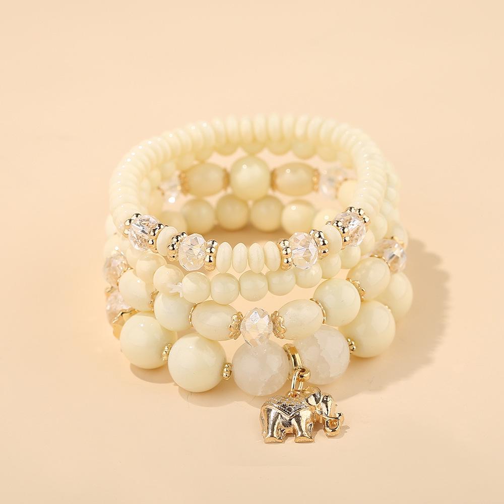 Bohemian Ethnic Style Layered Beaded Bracelet Set with Elephant Pendant and Stackable Crystal Accents