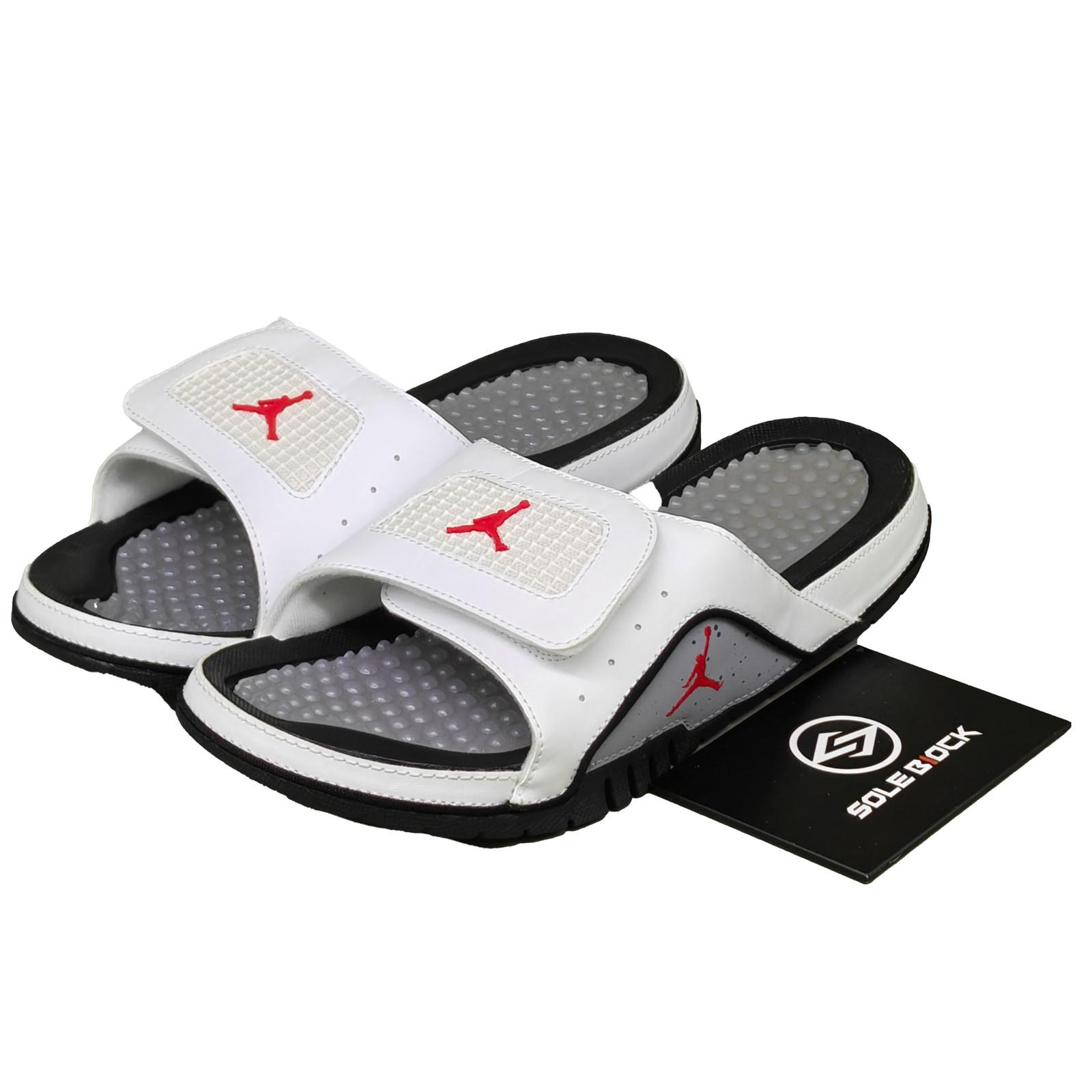 

Air Jordan Hydro 4 Retro Шльопанці White Cement 532225-116 47.5