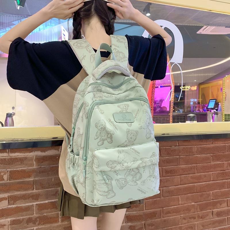 

Schoolbag women s Korean version large capacity light weight reducing backpack college student simple high school junior high school student strong b зелёный