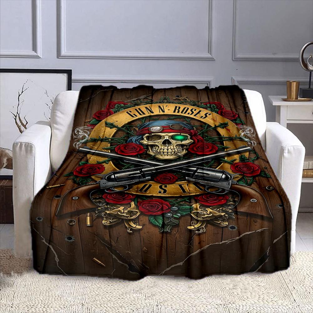 Skull with Guns and Roses Design Patterned flannel blanket perfect for the bedroom living room, sofa, or a little nap