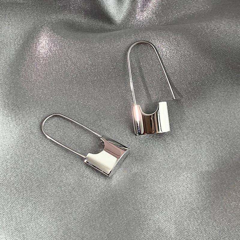 Cao Shi Minimalist Metal Cold Style Designer Earrings, Pin Lock Shape