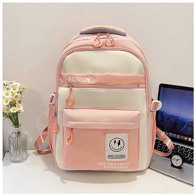 Hot-selling retro tooling wind contrasting color backpack male and female junior high school students versatile tide large-capacity schoolbag