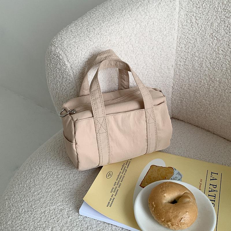 

Серебряная нейлоновая сумка через плечо, летняя женская повседневная сумка через плечо, цилиндрическая универсальная, высококачественная, модная, нишевая сумка