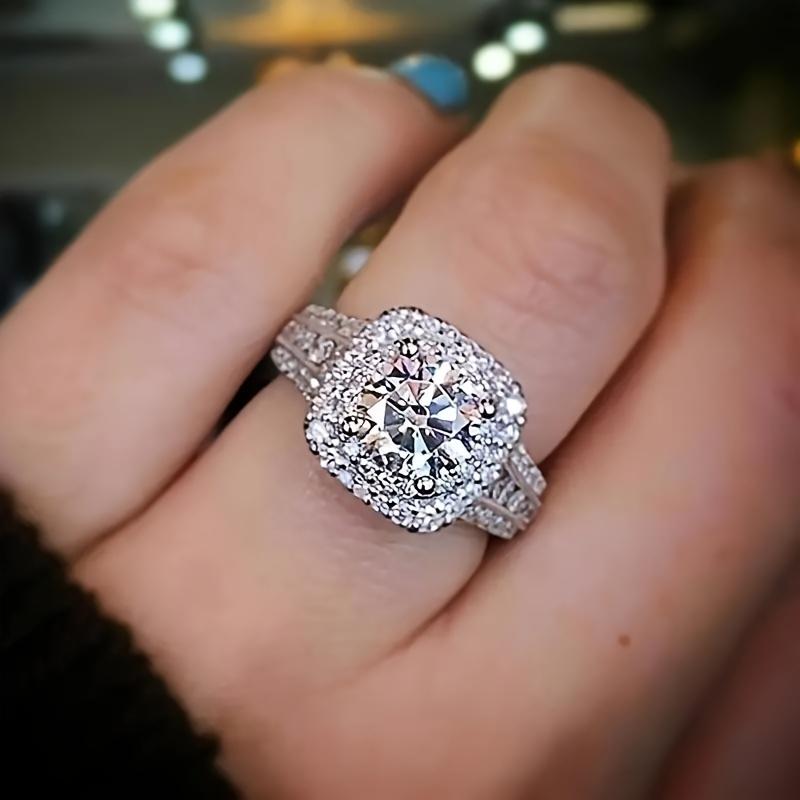 A Single Elegant Wedding Engagement Promise Ring With A Simple Inlaid Sparkling Zirconia. 11