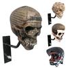 Držák na motocyklovou helmu Lebka - Nástěnný stojan pro uložení helem, bund, čepic, baseballových a ragbyových helem, pryskyřičný design