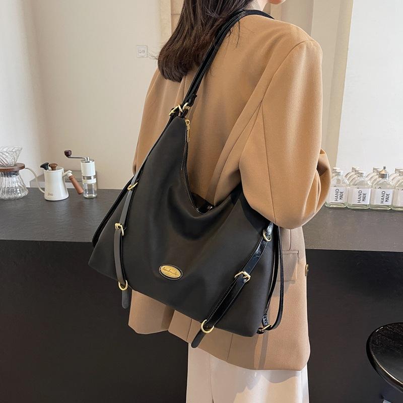 Herbst und Winter Beliebter Retro Wildleder Rucksack Damen Neuer College-Stil Pendlertasche Trendige Tragetasche mit großer Kapazität