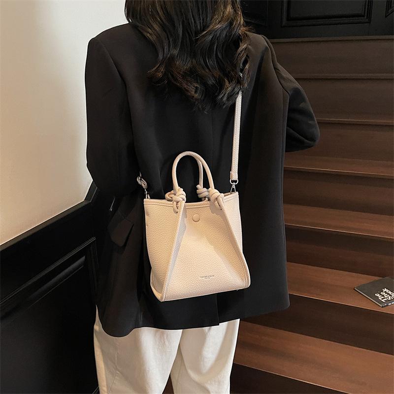 Korean Version of Niche Portable Commuter Bag Women's 2025 New Simple Bucket Bag Versatile Shoulder Cross Wing Bag