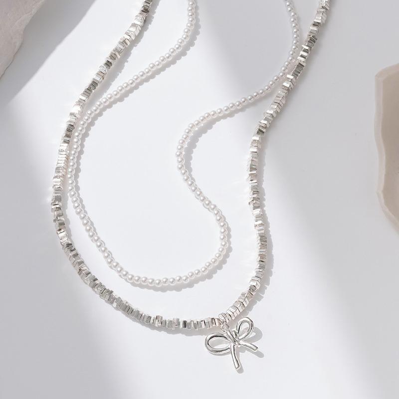 New Bow Necklace Women's Simple and High-end Retro Double-layered Design Imitation Pearl Collarbone Chain