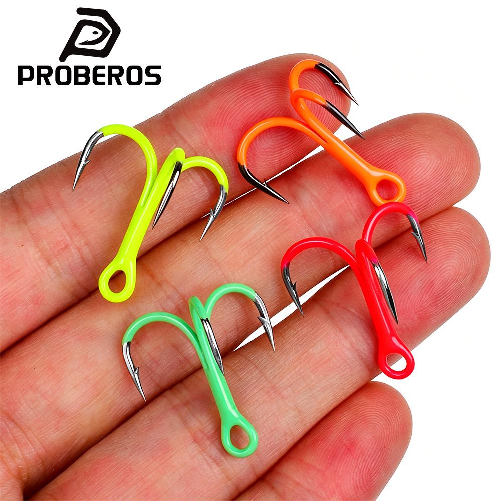 Glow-in-the-Dark Fluorescent Treble Hooks with Colored Reinforced Hair Ties and Three-Prong Design.