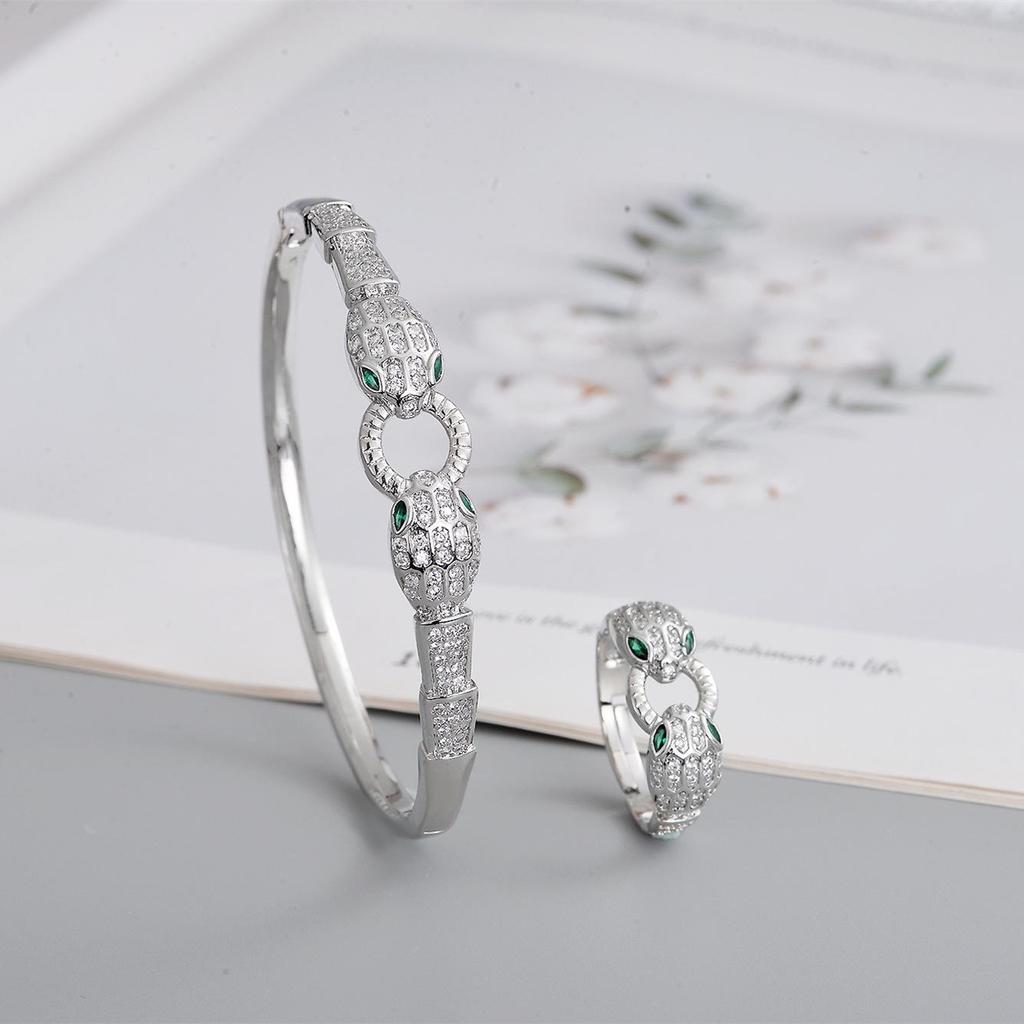 2026 Trendy Gold-Plated Copper Snake Bracelet & Ring Set with Green Eye and Full Diamond Micro-Pave