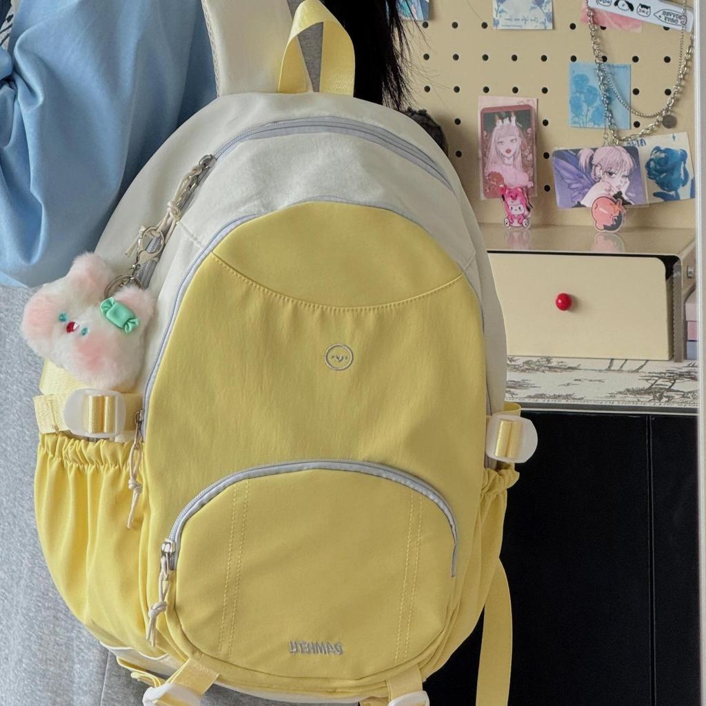 High-value color matching schoolbag for female junior high school casual and versatile, simple backpack, large-capacity student computer backpack tide