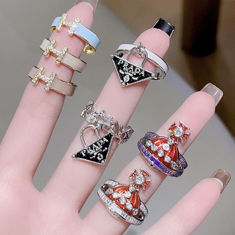 Tropfendes Öl Saturn Persönlichkeit Leichter Luxus Hohes Gefühl Offener Ring Nischen Design Kalter Wind Mode Ring