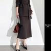 Elegant Coffee-Colored Collarless Skirt Suit for Women with Waist-Cinching Belt - Perfect for Urban Professional Style and Commuting.