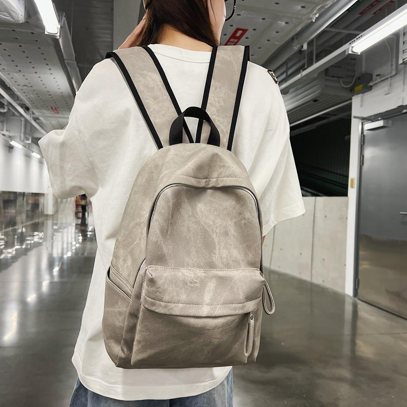 

New fabric solid color graffiti color student schoolbag daily commuting travel large capacity backpack светло-серый