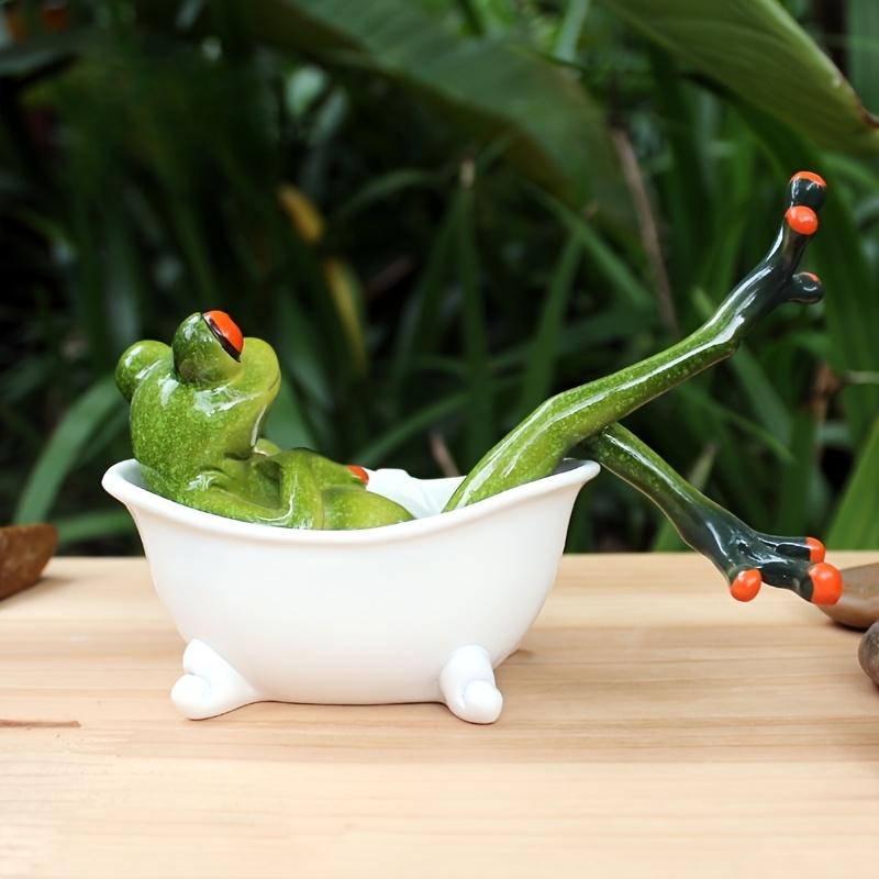 A Whimsical Frog Statue with a Unique Design of a Frog Taking a Bath Perfect for Home Decor Both Indoors And Outdoors
