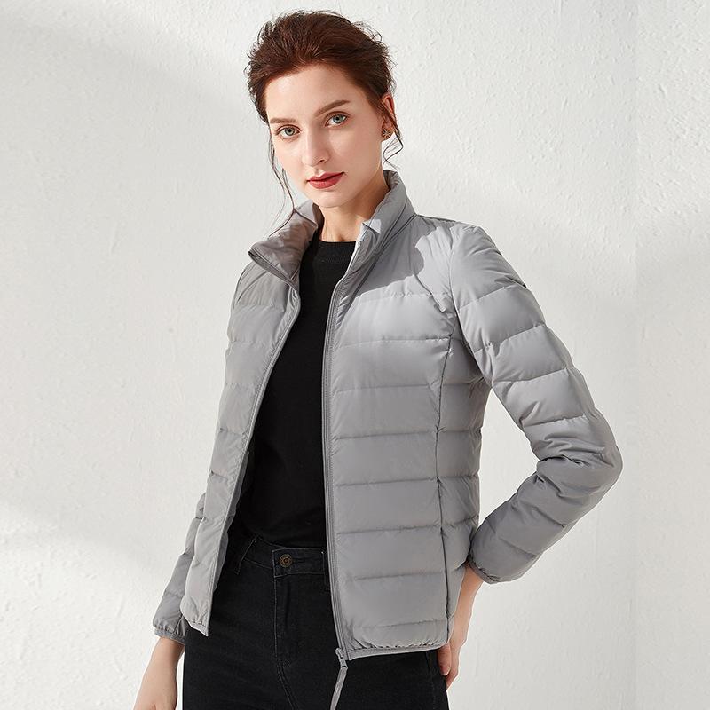 Down jacket women's light and seamless glue pressing autumn and winter new stand-up collar short cold-proof slim-fitting white duck down jacket