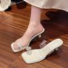 Soft leather bow rhinestone transparent sandals women's high heels are not tired of feet summer new French fairy thick heel cool slippers