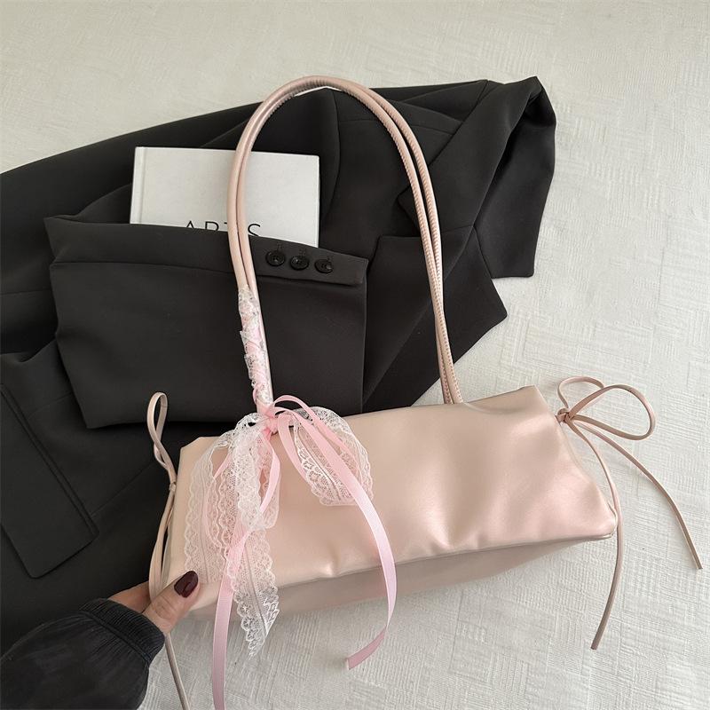 Korean version of simple ins baguette bag women's 2025 new trendy versatile commuter shoulder bag casual bow armpit bag