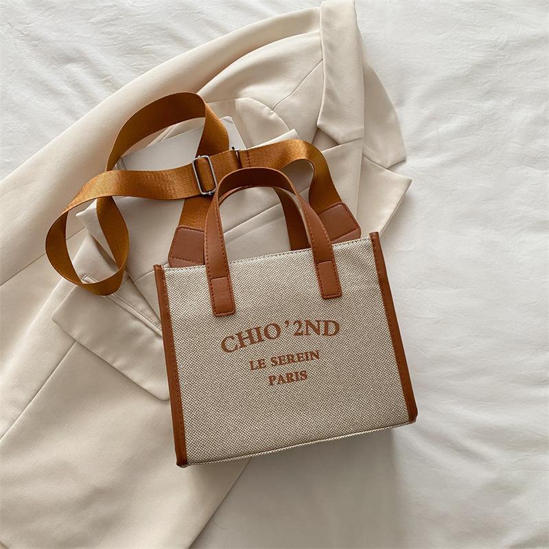 

Женская холщовая сумка 2025 года, новая модная сумка с буквенным принтом, сумка-мессенджер большой вместимости для студентов коричневый