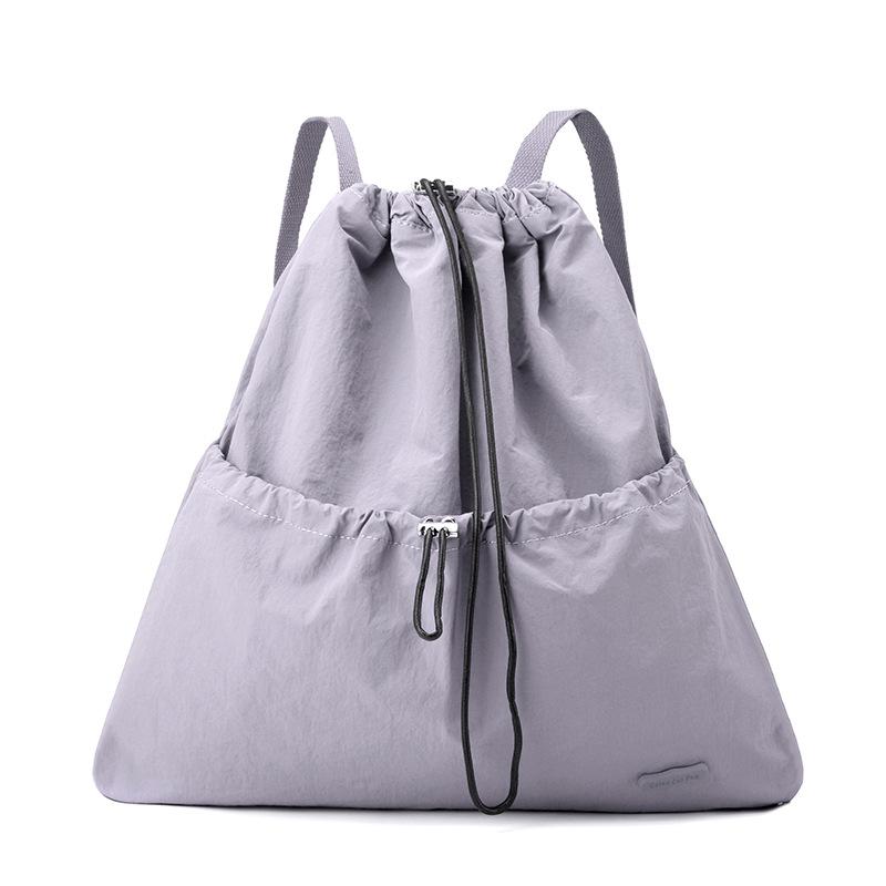 Niche daily leisure lightweight sports drawstring backpack commuter student schoolbag