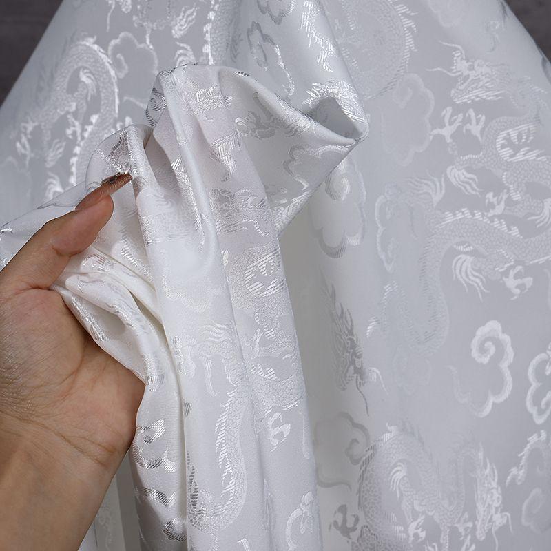 High-end dragon-patterned jacquard satin fabric suitable for wedding dresses formal gowns and designer clothing fabrics