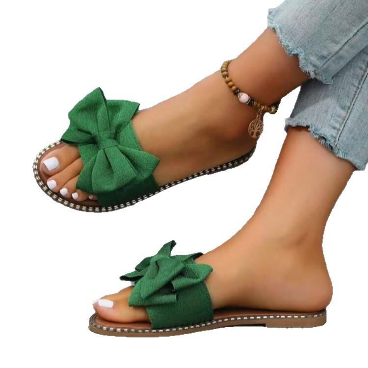 Foreign trade new flat-bottomed rhinestone bow one-word slippers women wear solid color light cloth cool slippers 2025