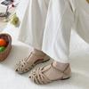 French summer new hollowed-out one-word strap Roman shoes flat-bottomed bag head sandals women's Mori women's niche design hollow