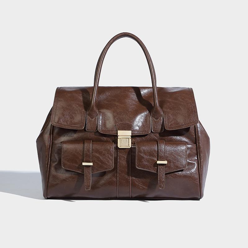 

Высококачественная сумка-тоут большой вместимости, повседневная универсальная, портативная, для документов, нишевый дизайн, сумка для поездок на работу и обратно темно-коричневого