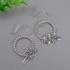 Hohles Kreis-Design mit Blumendekor, synthetische Edelsteine, eingelegte baumelnde Ohrringe, Retro-Böhmischer Stil, zartes weibliches Geschenk