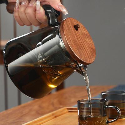 Skleněná konvice Enchantipot Press Control s dřevěnou rukojetí 750ml na sypaný čaj na čaj, oddělení vody