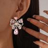 Eingelegter Strass Schleife Wassertropfen Fransen Ohrring für Damen Leichter Luxus High-End Hängeohrringe Süße Mode Zirkon Großhandel