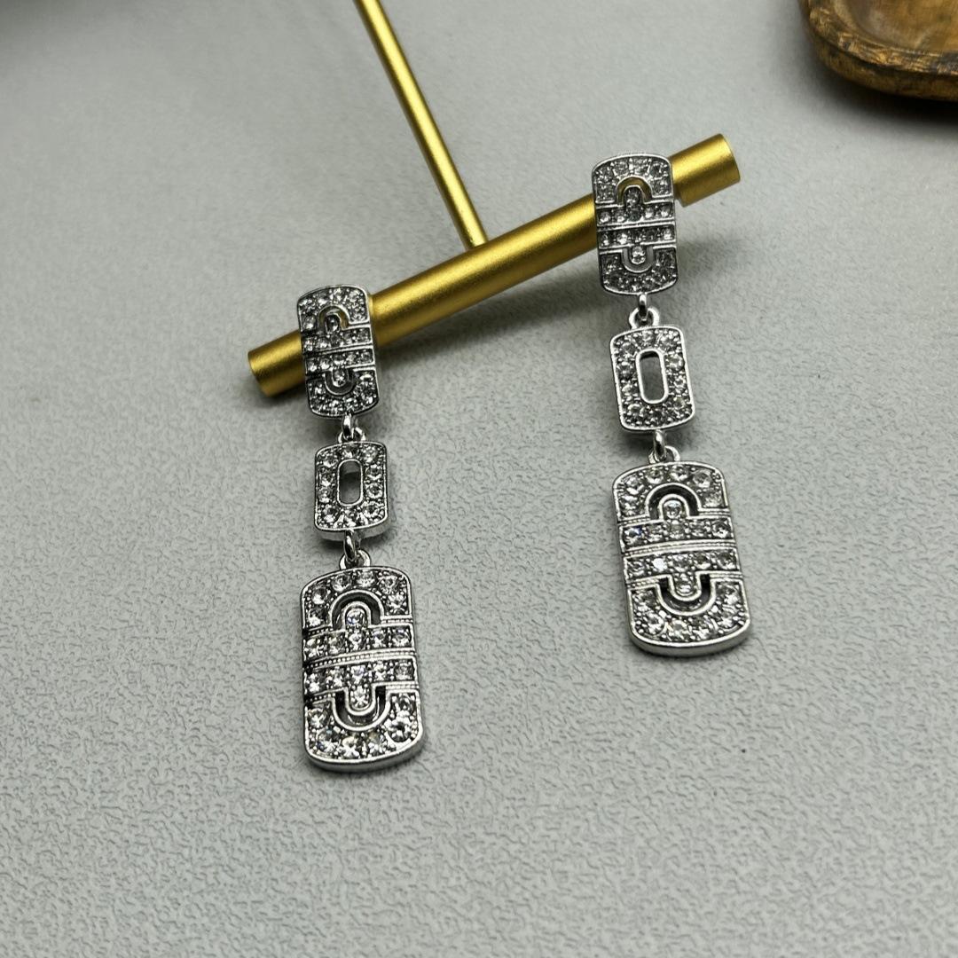 

Сережки-гвоздики геометричні, покриті гальванічним золотом, з імітацією срібла, повністю інкрустовані стразами, висококласні, ретро, нішеві, універсальні платиновий