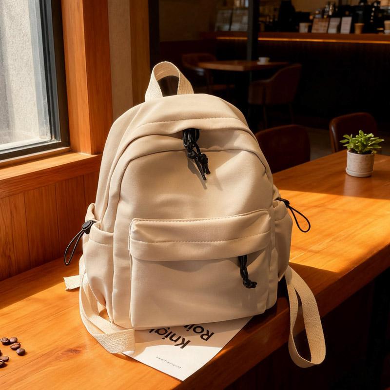 Minimalist Backpack for Women and Men Lightweight Nylon School Bag with Front Pocket