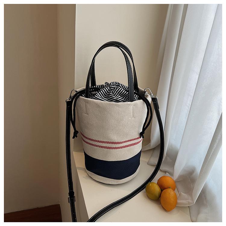 Hand carry simple casual bucket bag women  new fashion shoulder bag niche canvas messenger bag