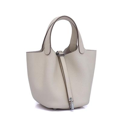 Women's TOGO Cowhide Bucket Bag - Large-Capacity Genuine Leather Handbag, Spring/Summer 2022 Collection