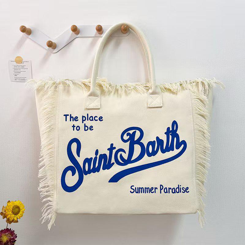 Large Capacity Canvas Tote Bag with Denim Fabric and Tassel Design for Commuting