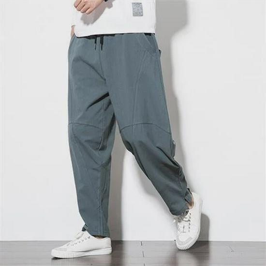 

Мужские льняные брюки больших размеров — свободный крой, повседневный стиль «шаровары», брюки-морковки с заниженным шаговым швом, смесь хлопка. 2XL (145-160 kg) серый